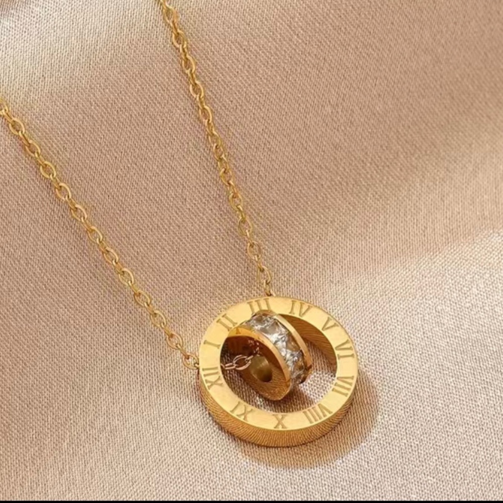 Roman numeral necklace.